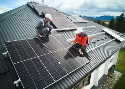 Technicians installing solar panels